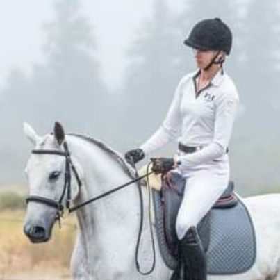 Makenzie Holley trainer on horseback